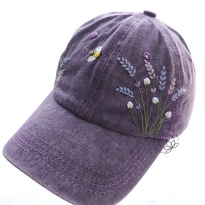 Purple denim baseball cap with hand-embroidered lavender sprigs and small bee motif
