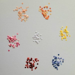 Tiny punched paper flower shapes, mixed pastel and dark colors, assorted sets
