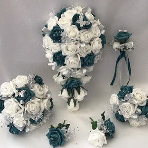 Wedding bouquet set with white roses and teal butterfly flowers, satin ribbon wrap