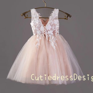 Flower girl lace tulle dress with sheer V-neck bodice and full tulle skirt