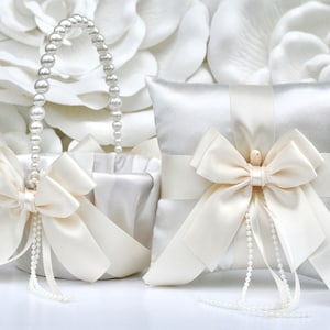 Ivory satin ring bearer pillow and flower girl basket with pearl bead trim and bows