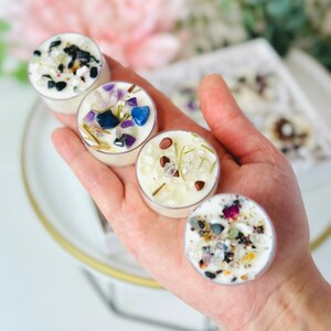 Crystal tealight candles in clear cups, assorted with blue, yellow, and floral details