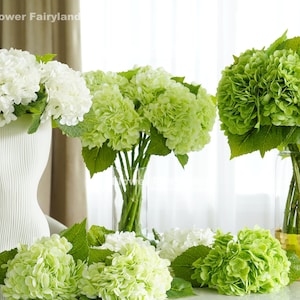 Artificial hydrangea flower stem with green and white clustered blooms