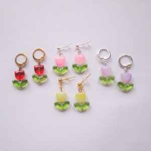Dainty beaded floral drop earrings with pink and green tulip-style flower charms