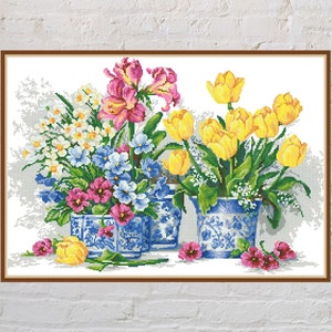 Floral garden bouquet cross-stitch pattern chart with colorful flowers in vases