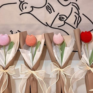 Crochet tulip flower bouquet set in wrapped kraft paper with white ribbon bows