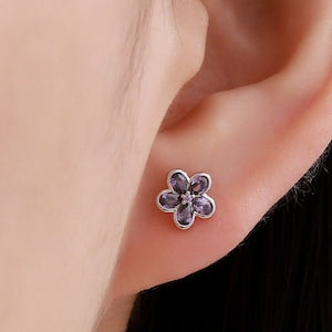 Amethyst purple CZ flower stud earrings in silver tone, small forget-me-not style