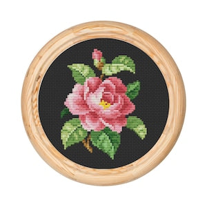 Rose floral cross stitch pattern in wooden embroidery hoop