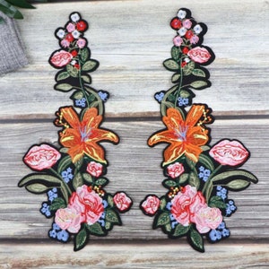 Embroidered iron-on flower patch set with roses, leaves, and ribbon details (pair)