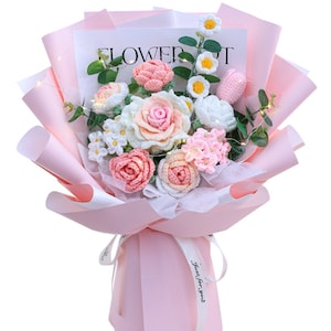Handmade crochet flower bouquet with pink and white blooms and small daisies