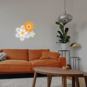 Flower-shaped LED neon sign with white glowing petals