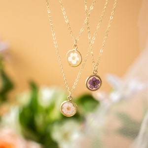Resin flower necklace with round floral pendants on silver-tone chains