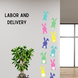 Colorful Easter bunny wall decals with office lettering and potted tree