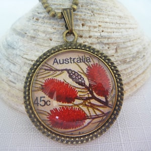 Bronze bottlebrush pendant necklace with red flower Australia 45c glass cabochon