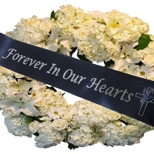 Memorial sash ribbon, black, with 'Forever In Our Hearts' text and cross motif