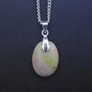 Marble pendant necklace with silver chain and pale pink oval stone, marbled finish