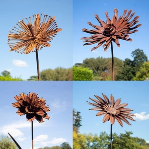 Rusted metal flower garden stake, circular pinwheel bloom on tall stake