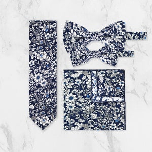Navy floral cotton necktie with matching bow tie and pocket square