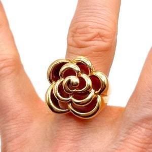 Gold rose cut-out flower ring with red enamel center on open petals