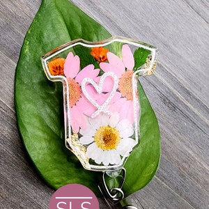 Floral baby romper badge reel with heart and flower print, clear badge holder and clip