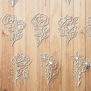 Botanical floral line art SVG clipart, white outline flowers and leaves on sheet
