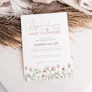 Baby shower invitation card with pink floral meadow flowers and text layout