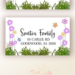 Pink floral rectangle recipient address label with "Santos Family" text