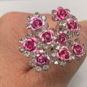 Set of pink and silver floral hairpins with rose-like rhinestone flowers