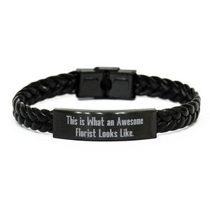 Braided black leather bracelet with rectangular engraved message clasp