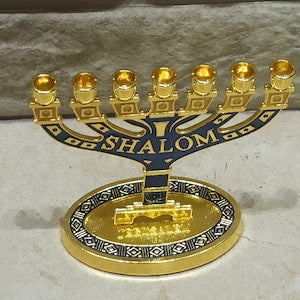 Gold 7-branch Star of David menorah with blue accents and SHALOM engraving