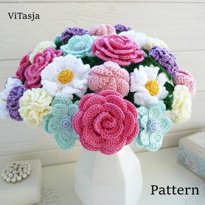 Crochet flower bouquet pattern featuring pink, purple, blue, and white crocheted blooms