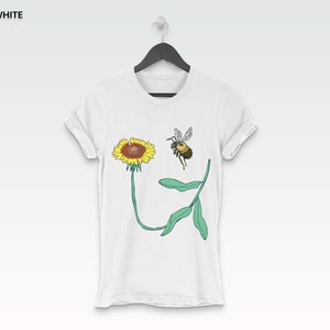 White short-sleeve T-shirt with bee and sunflower flower graphic