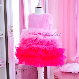 Pink ombre tutu tulle dress with layered ruffles, sleeveless bodice on mannequin