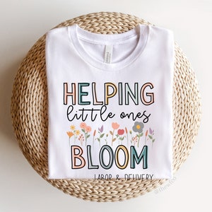 White T-shirt with 'HELPING little ones BLOOM' text and 'Labor & Delivery'