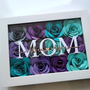 Mother's Day paper flower shadow box with teal and purple roses and 'Mom' cutout
