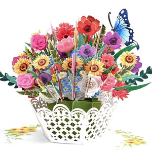 3D pop-up flower basket greeting card with colorful blooms and a blue butterfly