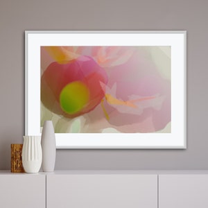 Abstract pink floral art print in a white frame