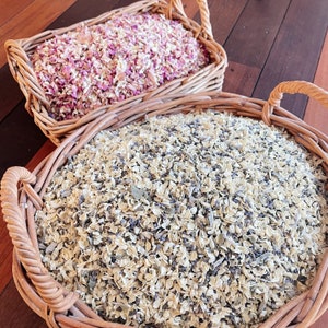 Biodegradable dried flower confetti in wicker baskets, pink and white pieces