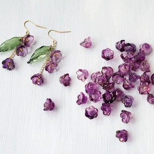 Purple bell flower beads with gold glitter, mixed sizes, with small earring hooks