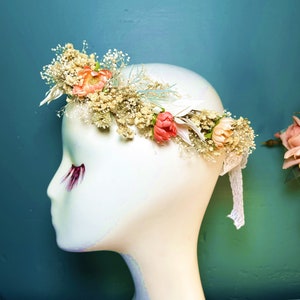 Dried floral baby headband crown with peach and gold flowers, soft fabric ties