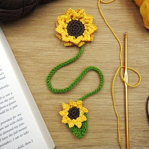 Crochet sunflower bookmark set with yellow flower motifs and green stem and leaf accents