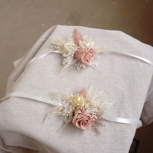 Pink and cream boho dried flower wrist corsage with rose buds and sheer ribbon
