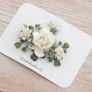 Sage green floral hair clip with cream and blush flowers and leaves