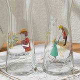 Clear glass cups with painted anime characters and decorative lettering