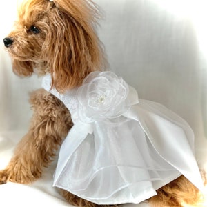 White organza flower girl dress with layered tulle skirt and flower bow