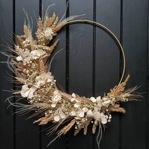 Handmade dried flower wreath with beige and cream tones