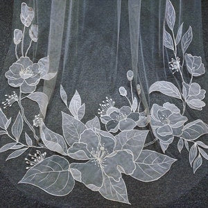 Bridal veil with sheer fabric and white floral leaf embroidery