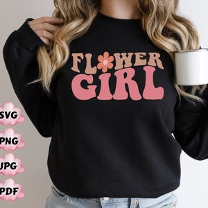 Black long-sleeve shirt with colorful 'FLOWER GIRL' graphic