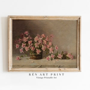 Vintage floral print wall art in a light wood frame, with pink and red bouquet on gray background