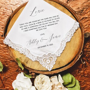 White lace-edged flower girl handkerchief with embroidered floral corner design